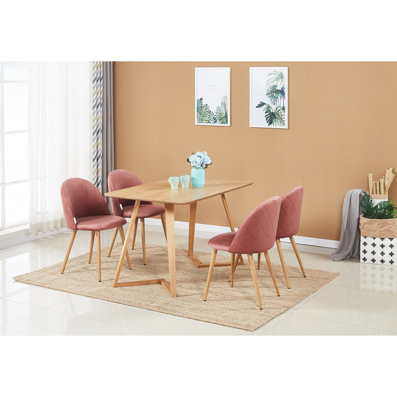 Scandinavian oak dining table set with velvet chairs in a stylish dining room arrangement.