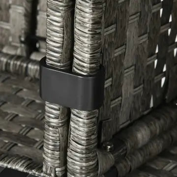 Close-up of a woven outdoor chair with a dark gray/black plastic band securing two vertical wicker strands together.