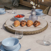 Maze Winchester 6 Seat Oval Rattan Dining Set – lifestyle garden setting