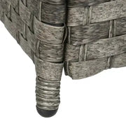 Close-up of a woven wicker chair corner on a white background